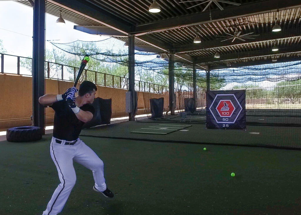 Baseball Player Using Line Drive Pro Hitting Net